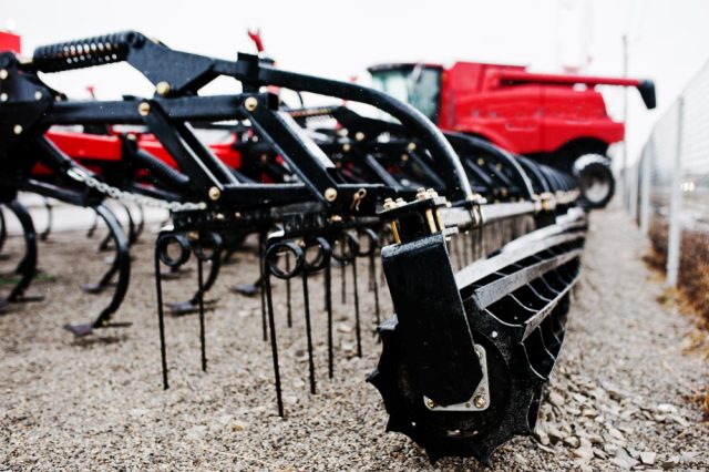 New Red Agricultural Seeder Close Up View