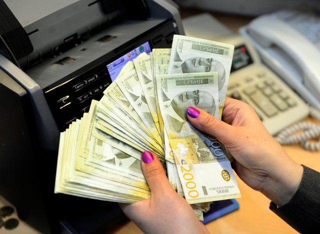 Belgrade,,serbia, ,circa,february,2019:,a,cashier,counts,serbian