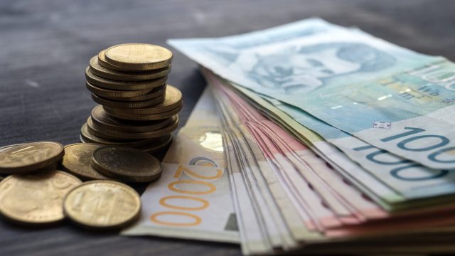 Serbian,money,dinar,,pile,of,coins,on,wooden,table,,close